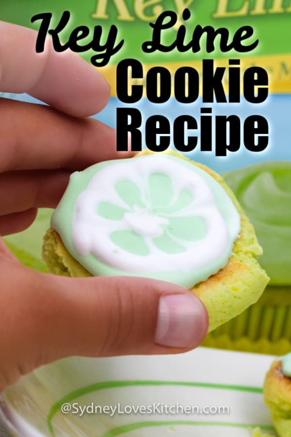 hand holding key lime cookie in front of Pillsbury key lime cake mix box