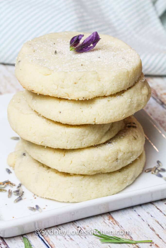 Stack of 5 lavender cookies on a white plate