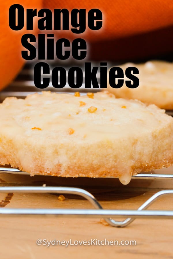close up of an orange cookie with glaze