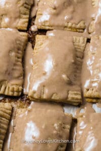 homemade pop tarts with frosting on a tray