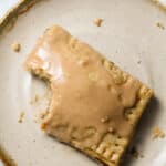 homemade pop tart with frosting and a bite out of it