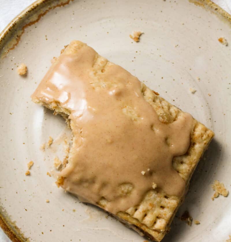 homemade pop tart with frosting and a bite out of it