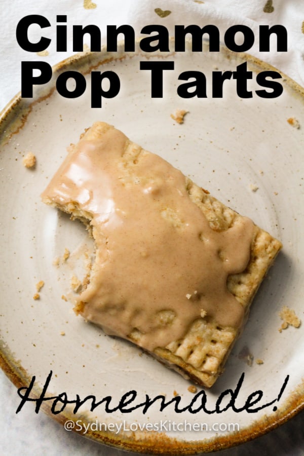 Overhead view of homemade pop tart with glaze on a plate.